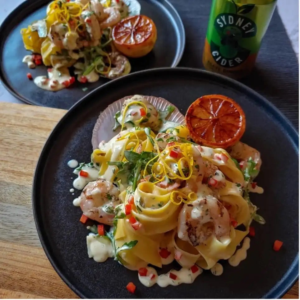 PAPPARDELLE PASTA WITH SCALLOPS & PRAWNS IN AN AGAVE GINGER CIDER SAUCE
